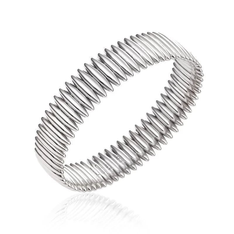 Wood - Carved Bangles with Intricate Celtic Patterns Chimento Armillas 18ct White Gold Wide Spike Bangle Wood - Carved Bangles with Intricate Celtic Patterns Chimento Armillas 18ct White Gold Wide Spike Bangle