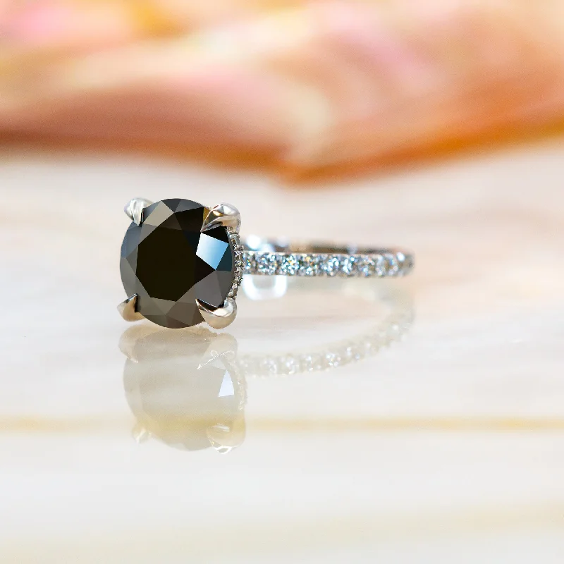 Vintage - Style Women's Diamond Rings with Floral - Engraved Bands and Multiple Diamond AccentsGravastar  -   Black & White   Natural Black Diamond Round Engagement Ring  in White  Gold