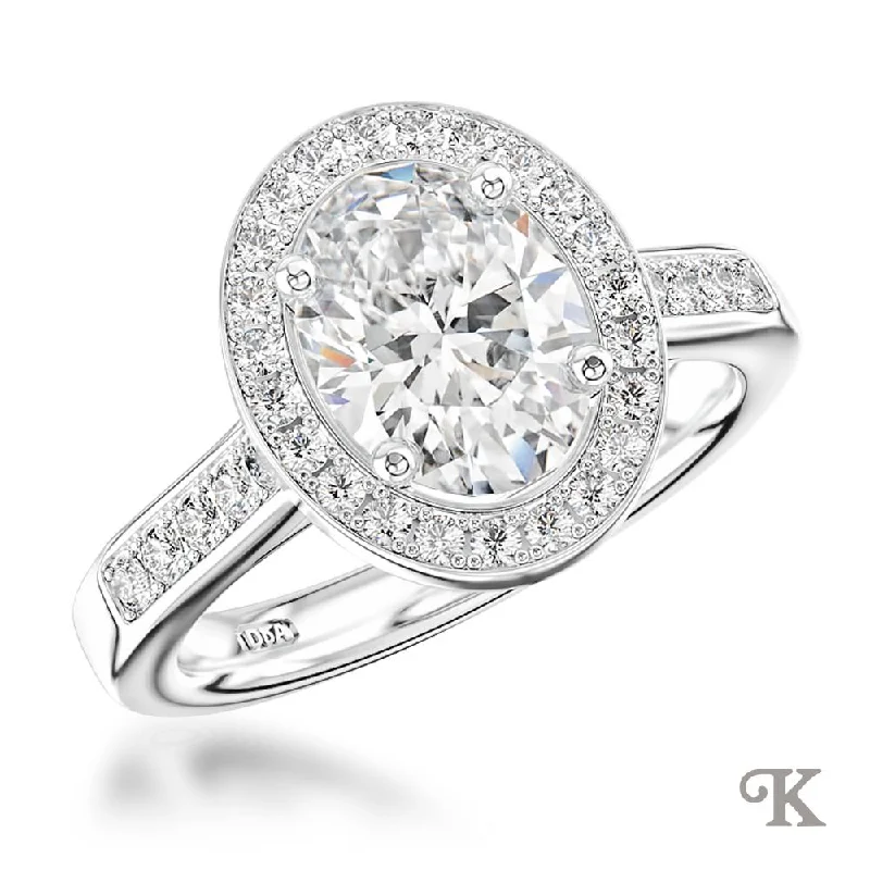 Men's Ruby Engagement Rings in Rose Gold with a Solitaire Design for a Romantic GestureIona Oval Halo Men's Ruby Engagement Rings in Rose Gold with a Solitaire Design for a Romantic GestureIona Oval Halo