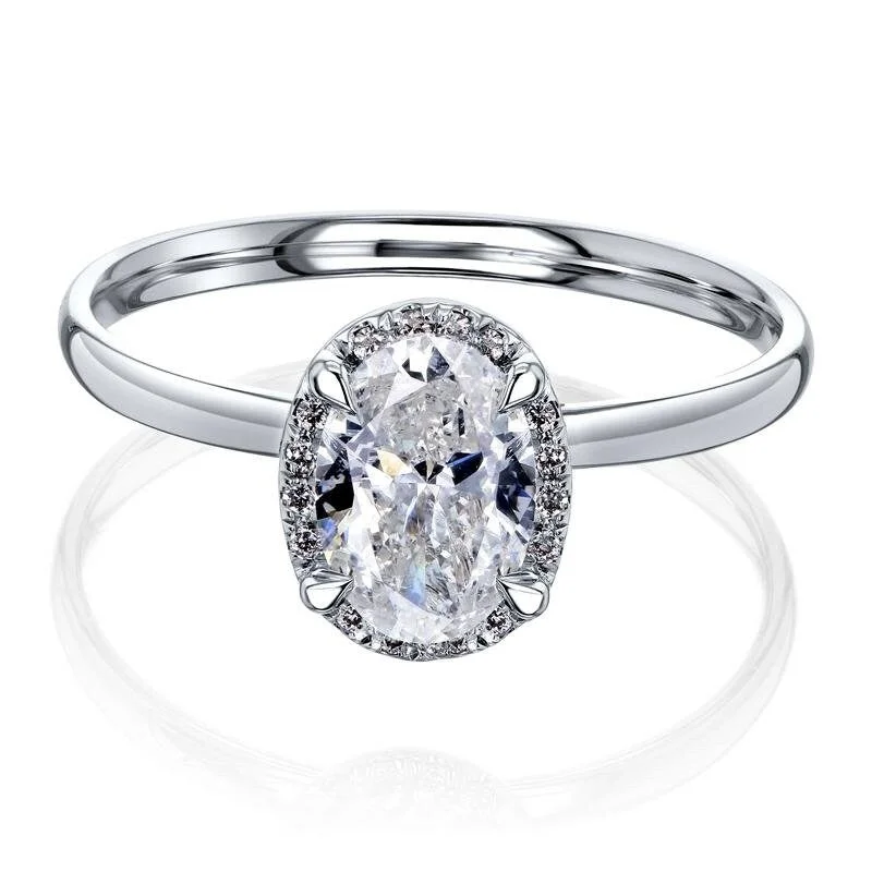 Women's Diamond Rings with Sapphire Accents in Blue for a Colorful and Sophisticated TouchAnnello by Kobelli Dalilah 14k White Gold Oval Diamond Halo Ring (GH/SI-I, HI/I) Women's Diamond Rings with Sapphire Accents in Blue for a Colorful and Sophisticated TouchAnnello by Kobelli Dalilah 14k White Gold Oval Diamond Halo Ring (GH/SI-I, HI/I)