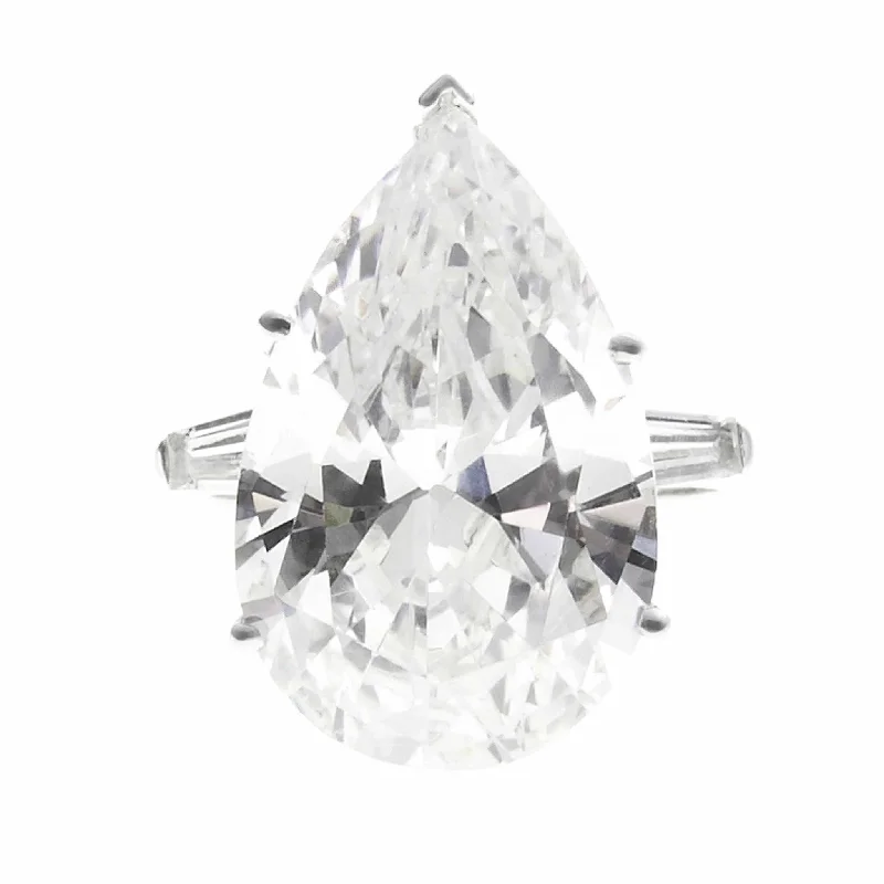 Men's Diamond Engagement Rings with Platinum Band and Halo Setting for a Luxury ProposalEngagement Ring - 18-Karat Pear Shaped Fifteen Carats Diamond Ring Men's Diamond Engagement Rings with Platinum Band and Halo Setting for a Luxury ProposalEngagement Ring - 18-Karat Pear Shaped Fifteen Carats Diamond Ring
