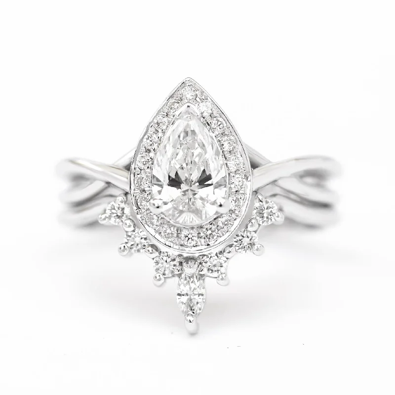Tennis - Style Women's Diamond Rings with a Continuous Row of Diamonds for a Classic and Versatile LookPear Diamond Halo Twist Band with Matching Romi Wedding Ring Set ♥ Tennis - Style Women's Diamond Rings with a Continuous Row of Diamonds for a Classic and Versatile LookPear Diamond Halo Twist Band with Matching Romi Wedding Ring Set ♥