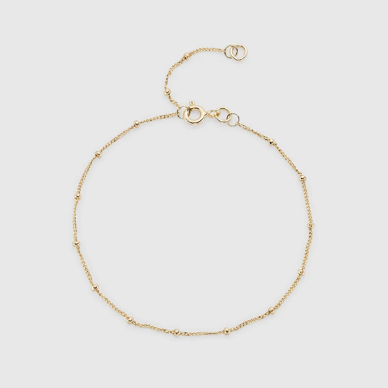 Boho - Style Bangle Bracelets with Feather and Bead EmbellishmentsBarbican 9ct Yellow Gold Beaded Bracelet Boho - Style Bangle Bracelets with Feather and Bead EmbellishmentsBarbican 9ct Yellow Gold Beaded Bracelet
