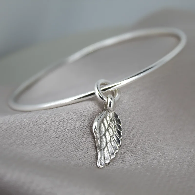 Handmade Bangle Bracelets with Polymer Clay Designs for a Personal TouchAngel Wing Charm Bangle Handmade Bangle Bracelets with Polymer Clay Designs for a Personal TouchAngel Wing Charm Bangle