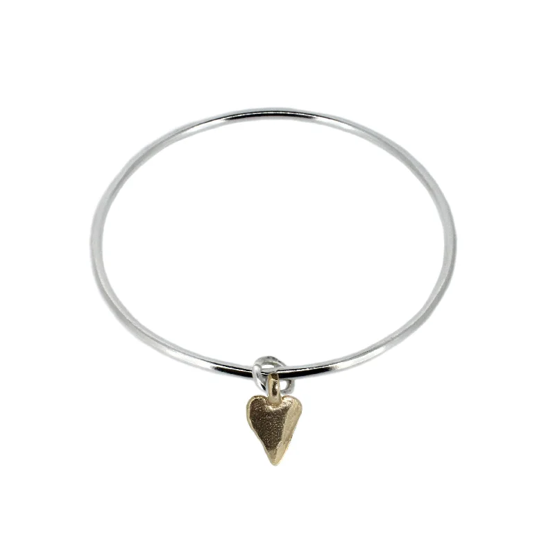 Solid Gold Bangles with Intricate Floral Engravings for a Luxurious LookGold Heart on Silver Bangle