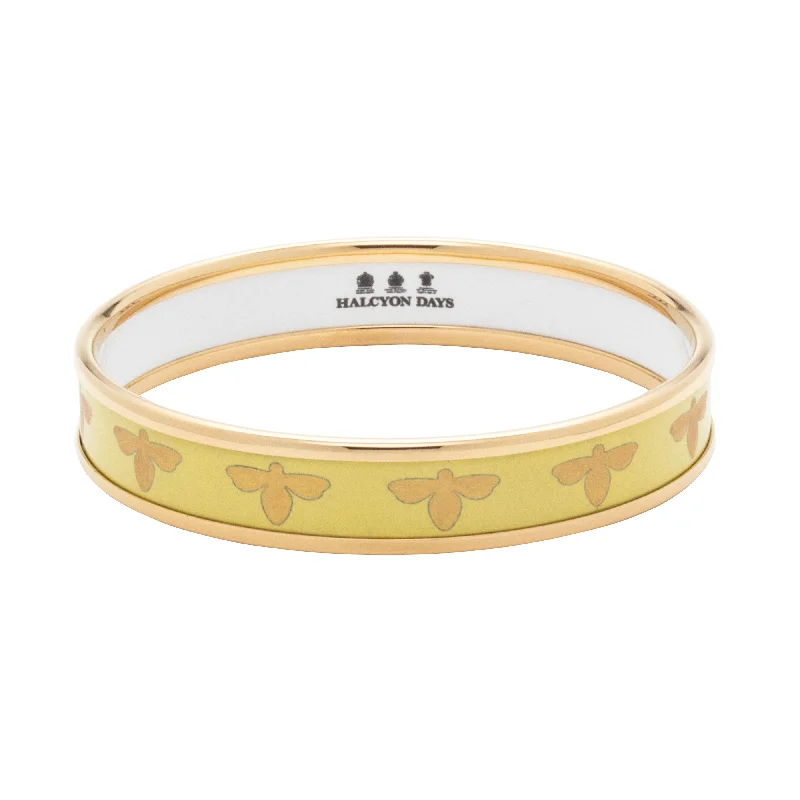 Solid Gold Bangles with Intricate Floral Engravings for a Luxurious LookBee Buttercup & Gold Enamel Bangle Solid Gold Bangles with Intricate Floral Engravings for a Luxurious LookBee Buttercup & Gold Enamel Bangle