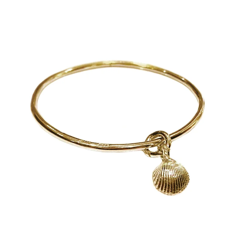 Leather - Wrapped Bangles with Studded Details for a Rock - Chic VibeGold Shell Bangle Leather - Wrapped Bangles with Studded Details for a Rock - Chic VibeGold Shell Bangle