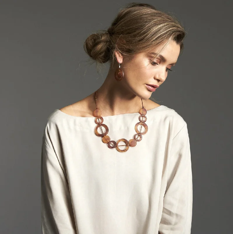 Leather - Wrapped Bangles with Studded Details for a Rock - Chic VibeCaravana Short Resin Necklace Leather - Wrapped Bangles with Studded Details for a Rock - Chic VibeCaravana Short Resin Necklace