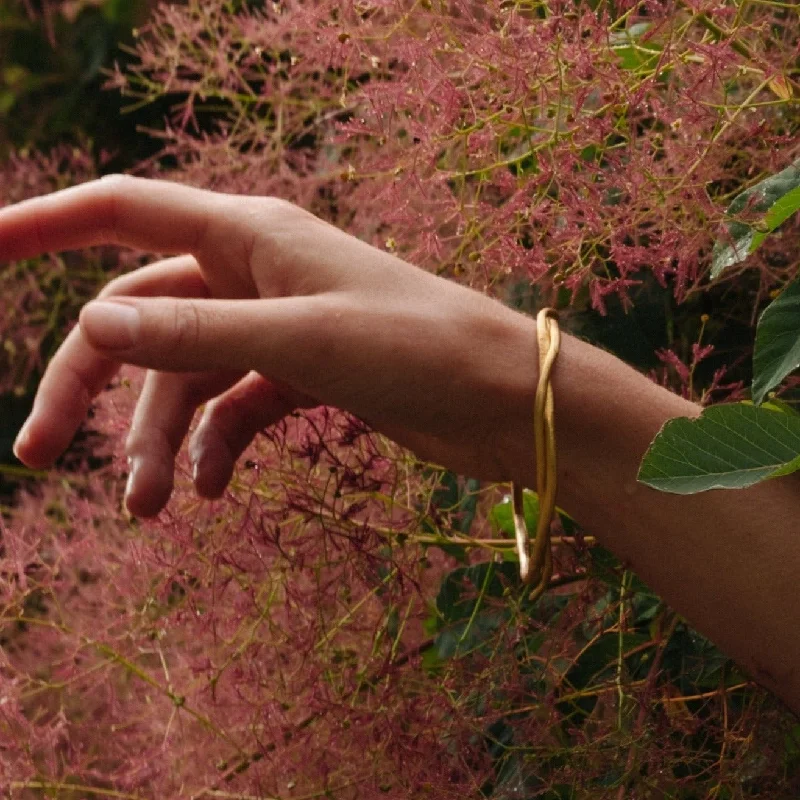 Rose Gold - Plated Bangles with Cubic Zirconia for a Glamorous TouchLaticauda Snake Bangle