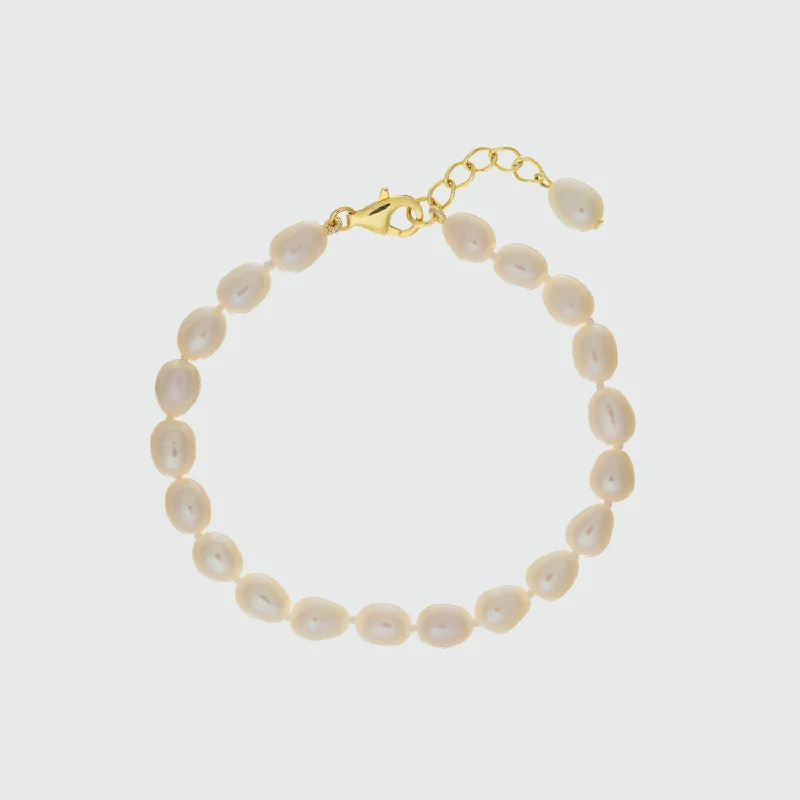 Men's Stainless Steel Bangle with Carbon Fiber Inlays for a Modern EdgeGloucester White Freshwater Pearl & Gold Vermeil Bracelet Men's Stainless Steel Bangle with Carbon Fiber Inlays for a Modern EdgeGloucester White Freshwater Pearl & Gold Vermeil Bracelet
