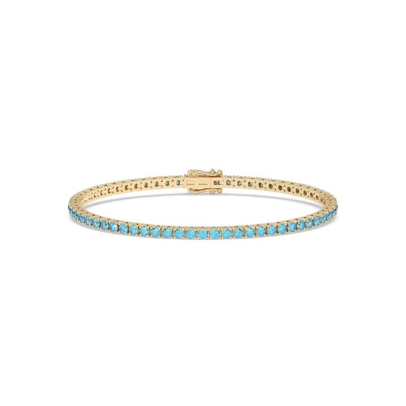 Solid Gold Bangles with Intricate Floral Engravings for a Luxurious LookBlue Topaz Tennis Bracelet Solid Gold Bangles with Intricate Floral Engravings for a Luxurious LookBlue Topaz Tennis Bracelet