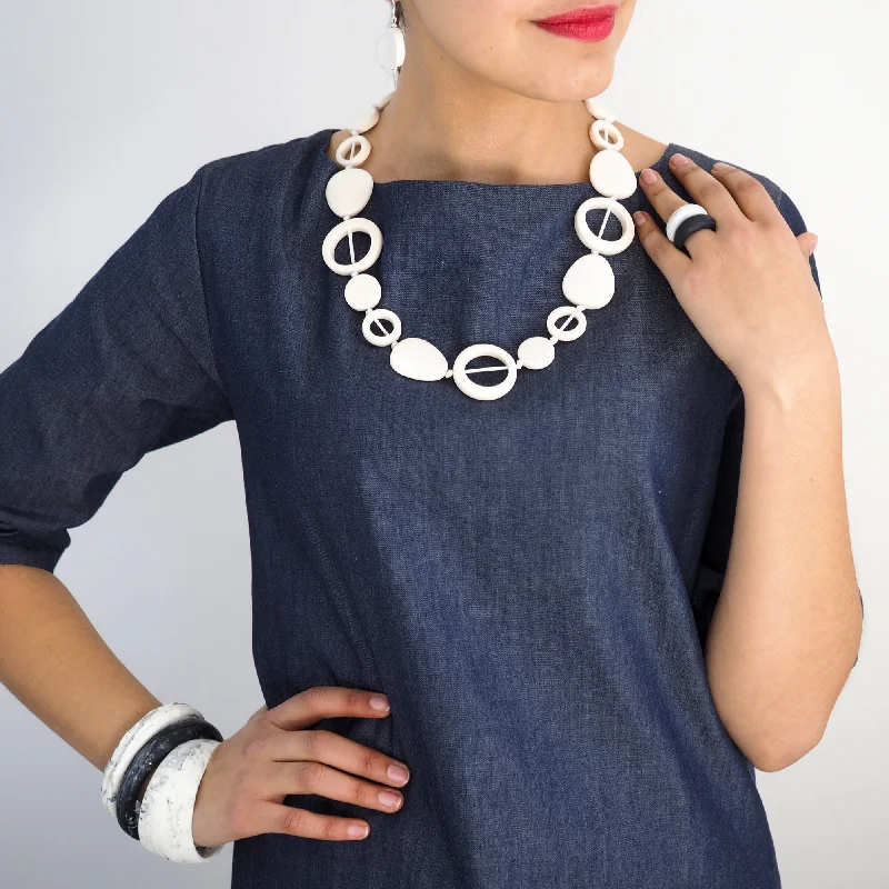 Leather - Wrapped Bangles with Studded Details for a Rock - Chic VibeTangier Short Resin Necklace Leather - Wrapped Bangles with Studded Details for a Rock - Chic VibeTangier Short Resin Necklace