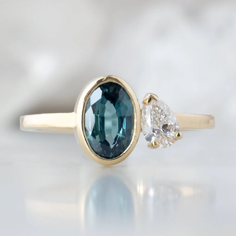Adjustable Engagement Rings with a Flexible Band and a Princess - Cut Center DiamondThe You and Me Ring | 1.11ct Oval Cut Sapphire in 14K Yellow Gold Adjustable Engagement Rings with a Flexible Band and a Princess - Cut Center DiamondThe You and Me Ring | 1.11ct Oval Cut Sapphire in 14K Yellow Gold