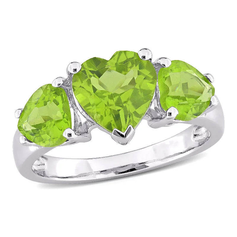 Tanzanite Gemstone Rings in 10K Gold with a Trilogy Design for a Sophisticated GiftMiadora 3 1/3ct TGW Peridot 3-Stone Heart Ring in Sterling Silver Tanzanite Gemstone Rings in 10K Gold with a Trilogy Design for a Sophisticated GiftMiadora 3 1/3ct TGW Peridot 3-Stone Heart Ring in Sterling Silver