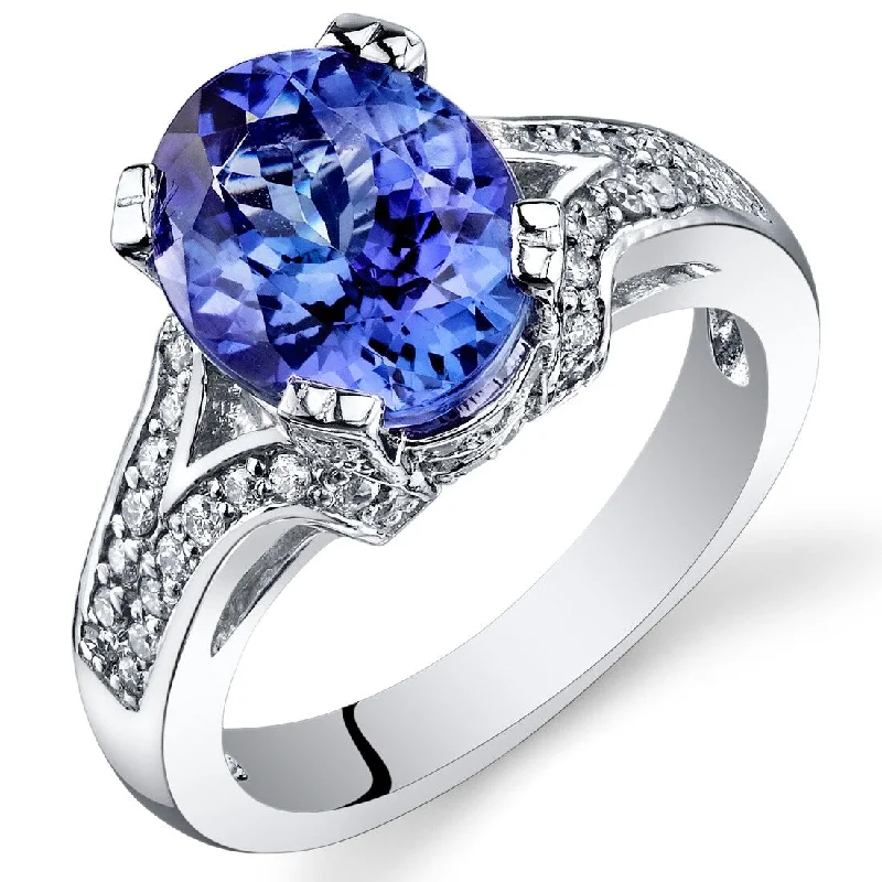 Malachite Gemstone Rings in 14K Gold with a Carved Stone for a Unique and Artistic AppealOravo 3.89 ct Tanzanite Oval and Diamond Ring in 14k White Gold Malachite Gemstone Rings in 14K Gold with a Carved Stone for a Unique and Artistic AppealOravo 3.89 ct Tanzanite Oval and Diamond Ring in 14k White Gold
